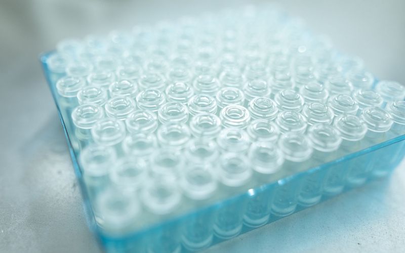 A tray of frosted vials used for frozen storage